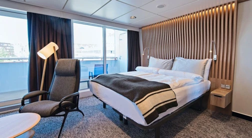 Cabine extérieure accessible aux fauteuils roulants avec balcon